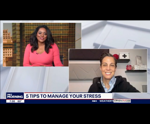 Two women on a news show discussing stress management, one in a studio and the other on a video call, with the title "5 tips to manage your stress" displayed.