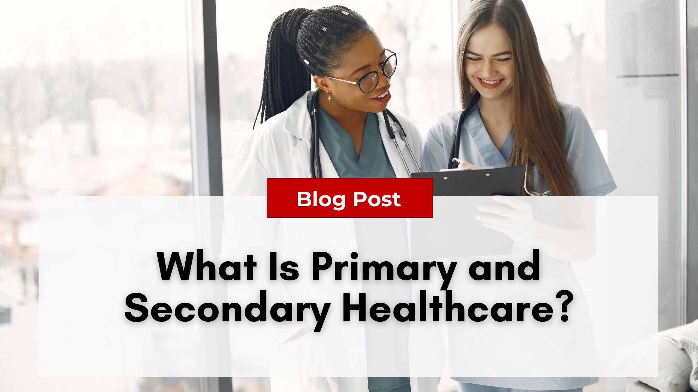 Two healthcare professionals, one in a white coat and one in scrubs, discuss something on a clipboard. Text overlay reads, "Blog Post: What Is Primary and Secondary Healthcare?" Learn how nurse practitioner burnout impacts both.